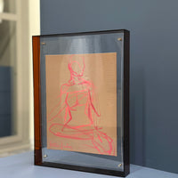 Framed figure in acrylic frame