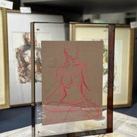 Framed figure in acrylic frame