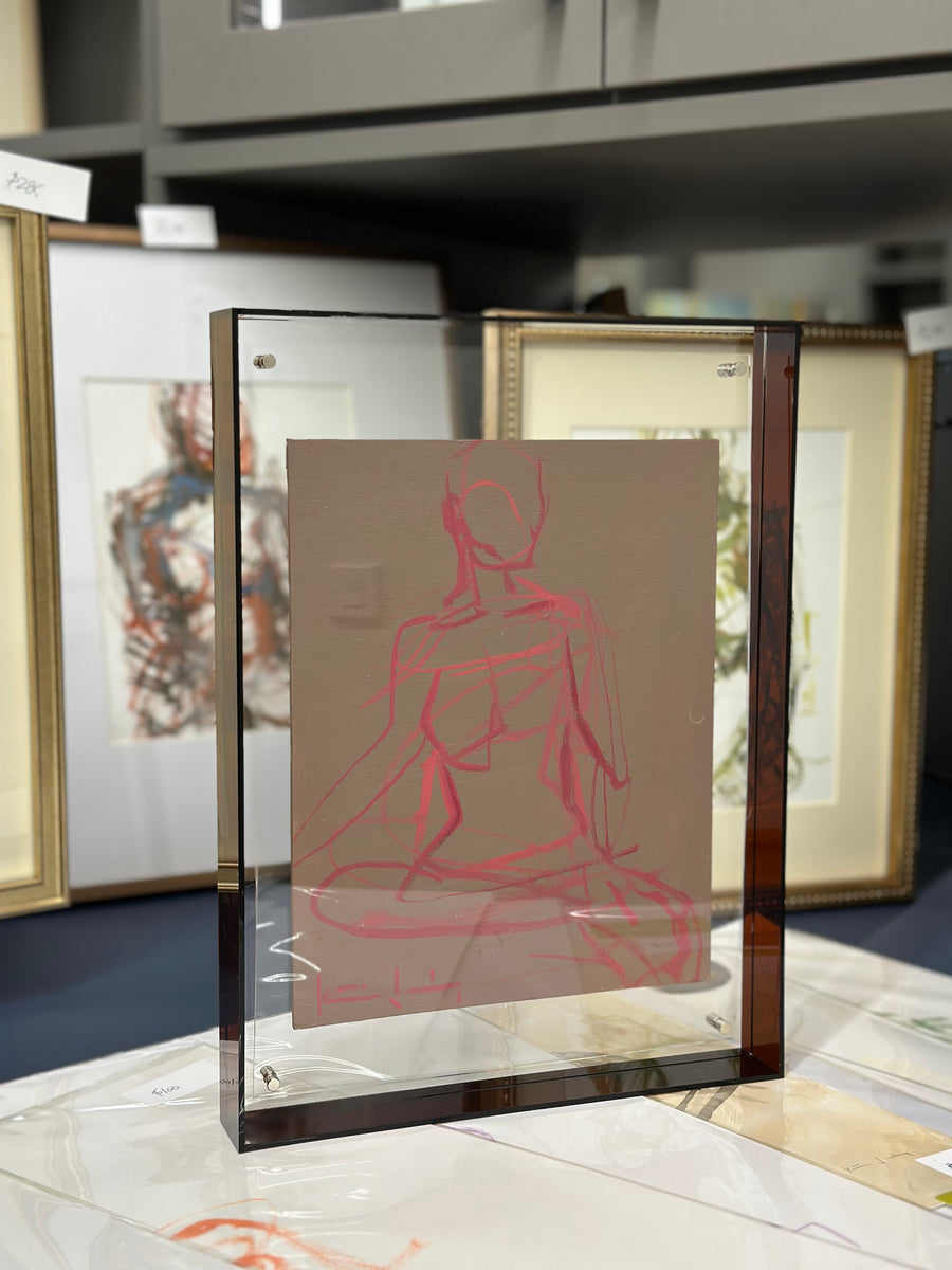 Framed figure in acrylic frame