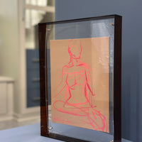 Framed figure in acrylic frame