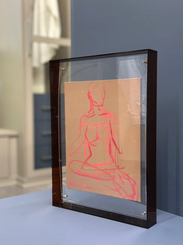 Framed figure in acrylic frame