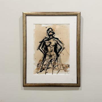 Framed coffee and ink figure