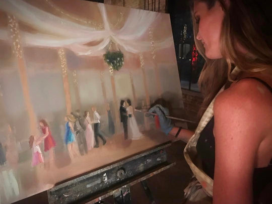 Katie Jacobson Finishing a Live Wedding Painting in a Ballroom